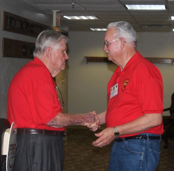 The Waldman Collection - Presenting Gifts
Host Jerry Orr presents a "challenge coin" to Ernie Kingcade.
