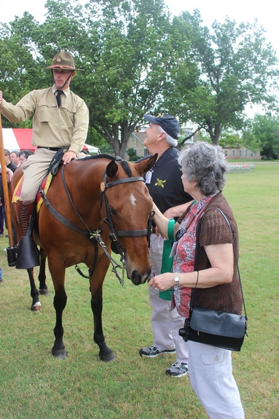 The Waldman Collection - Retirement Ceremony
"Yep, Lieutenant...the horse is real".  Wayne Crochet and spouse Carol chat with one of the riders after the retirement ceremony on the parade field,
