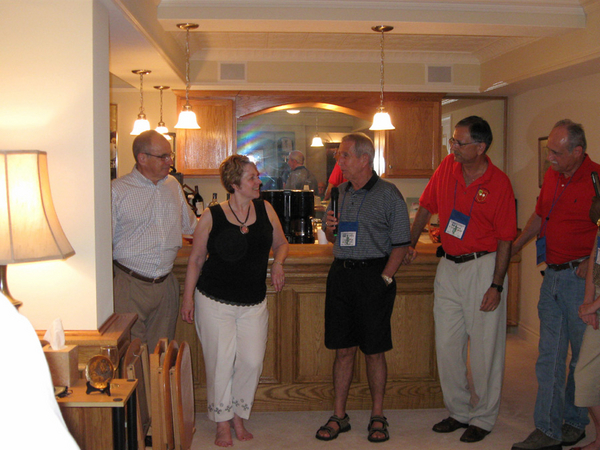 "Thank You Very Much"
Dave Collins serves as Emcee thanking hosts Roy & Linda Hoffman.  Tom Roman and Byron Kurtgis, brother of FO Mike Kurtgis look on.
