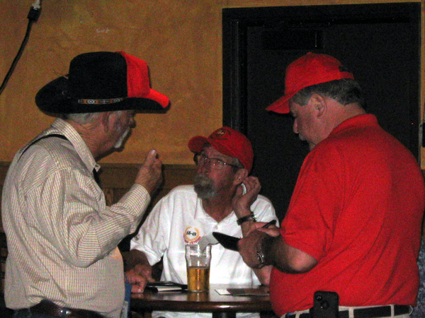 Story-Telling
Now we're into it!  Cowboy Danny Fort makes his point to Joe Henderson while Jim Connolly calculates his tab at the bar.
