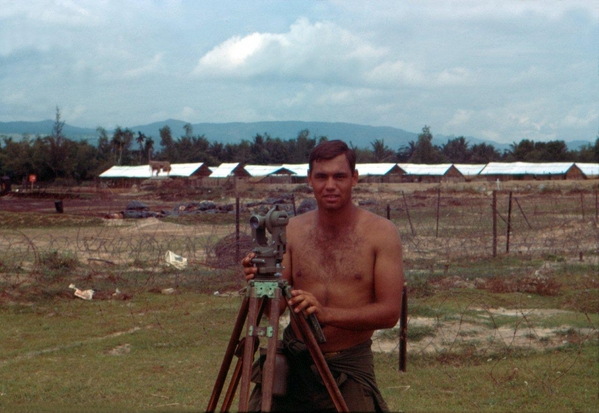 Artillery Surveyor
Sp4 Danny Yates operates a Theodolite.  His job was to get coordinates for every bunker on the base perimeter.
