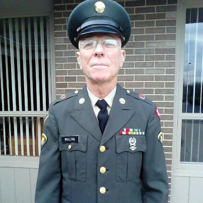 Modern Day John "Moon" Mullins
John proudly poses in his uniform (notice that it actually fits!) for Veteran's Day, 2012.  Looking good, John!
