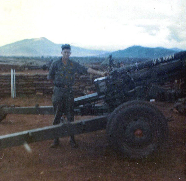 Base Camp, 1966
PFC Marion Sullivan standing between the trails.

