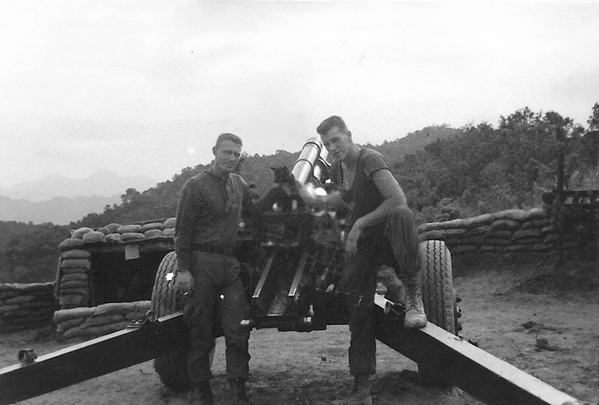 Gun "Buddies"
PFC Hourigan and Cpl John Kuntz.  LZ Corral, March, 1967.
