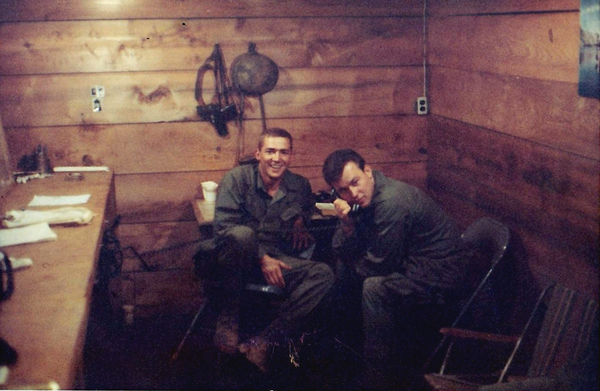 Inside the 1/69th Armor
December, 1968.  Eugene E. Lea and me.  I'm looking at the camera and Lea has the radio mic in his hand.  (Note the electrical outlet in the corner)

