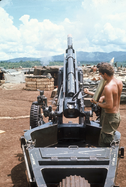 Message for Charlie
UNKNOWN Cannoneer loads the newer M102 howitzer model.
