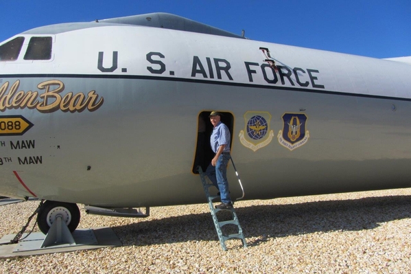 This was the "Freedom Bird" for me
Many of us came home to Travis AFB aboard C-141's.  It was a real hoot to go back there
and take a tour of one of those planes.  I've included a picture of me and the C-141 I came home on.  It was taken at Clark AFB in the Philippines.
