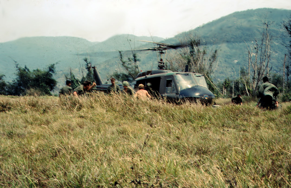 Air Delivery
Soldier in the foreground gives the Huey pilot the "thumbs up" to pull out.  Delivery complete.
