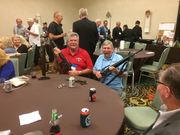 Hospitality Suite
Jim Connolly and Joe Henderson with M-16s?  No one is safe now!
