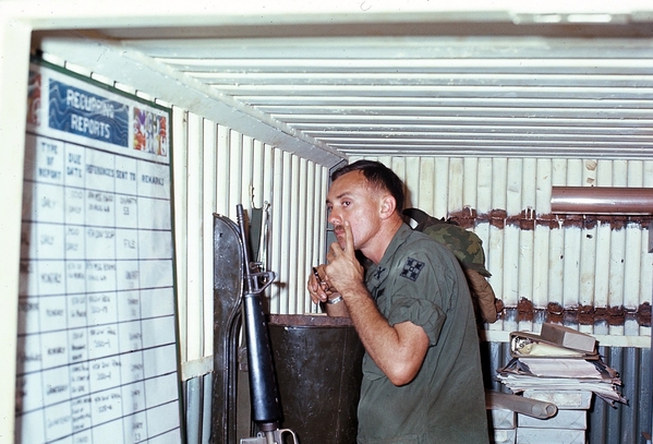 Doing a little trim
Lt Steve Huffstutler, later killed in action during the infamous "Mothers Day" assault at LZ Oasis, May, 1969, trims the mustache...carefully.
