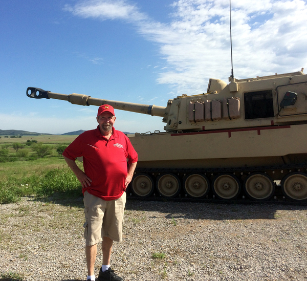 Thursday Firepower Demonstration
Joe Henderson standing in front of the Paladin, the new 155mm howitizer.

Photo courtesy of Joe Henderson.
