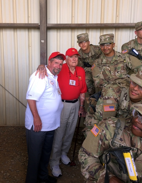 Firing Range
Joe Henderson and Jerry Orr posed with trainees at the firing range.  Our visit to the firing range provided an opportunity for the trainees to mingle and ask questions of us old, retired veterans.
