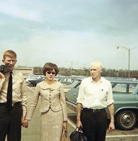 Second trip
I had "compassionate leave" from Nam due to the death of my mother.  This was taken at the Pittsburgh, PA airport as I was returning from leave.  I am pictured with my uniform jacket over my shoulder, walking with my fiance' Joanne and my father.  This photo captures the feel of the 1960s.
