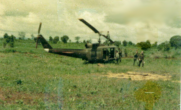 Memories of LZ St George
A slick unloads personnel.  An "everyday" sight in Vietnam.
