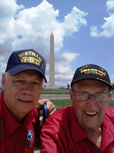 Honor Flight to DC
I spent this past weekend (June, 2015) acting as Escort for my wife's uncle on
an Honor Flight to Washington, DC.  Earl Tennerman was in the Navy, and
wounded at Peleliu in the Palau Islands when his ship was hit by enemy fire.
We participated in the 71st anniversary of D-Day commemoration service.  Earl got to lay a
wreath at the World War II memorial.
