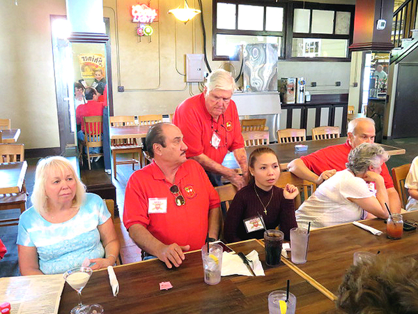 Old Plantation - Thurs Evening Dinner
Long-time buddies in combat, Mike Kurtgis chats with Jerry Orr (deceased).  Martha Henderson at left, Mercy Kurtgis next to Mike, Carol & Wayne Crochet at far right.

Photo courtesy of Barbara Moeller
